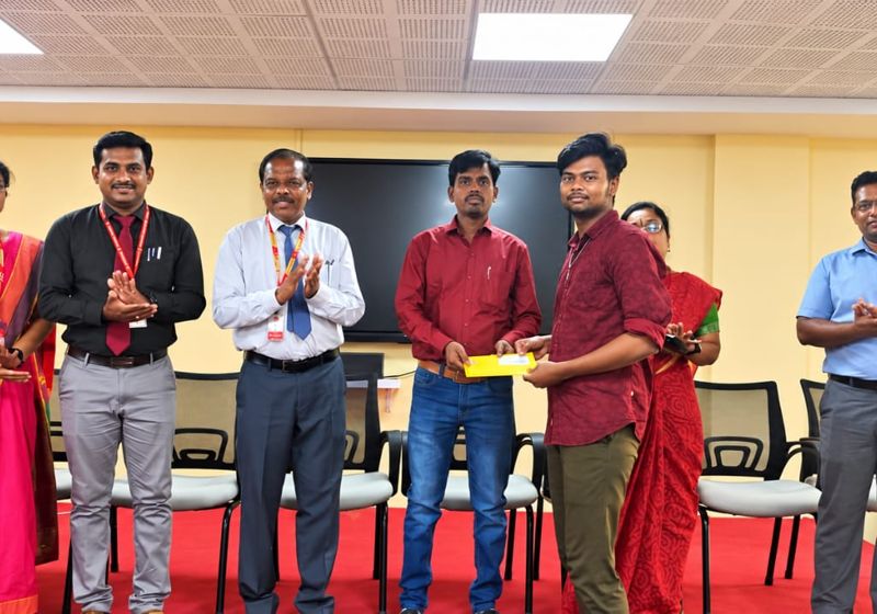 Award presentation with faculty members